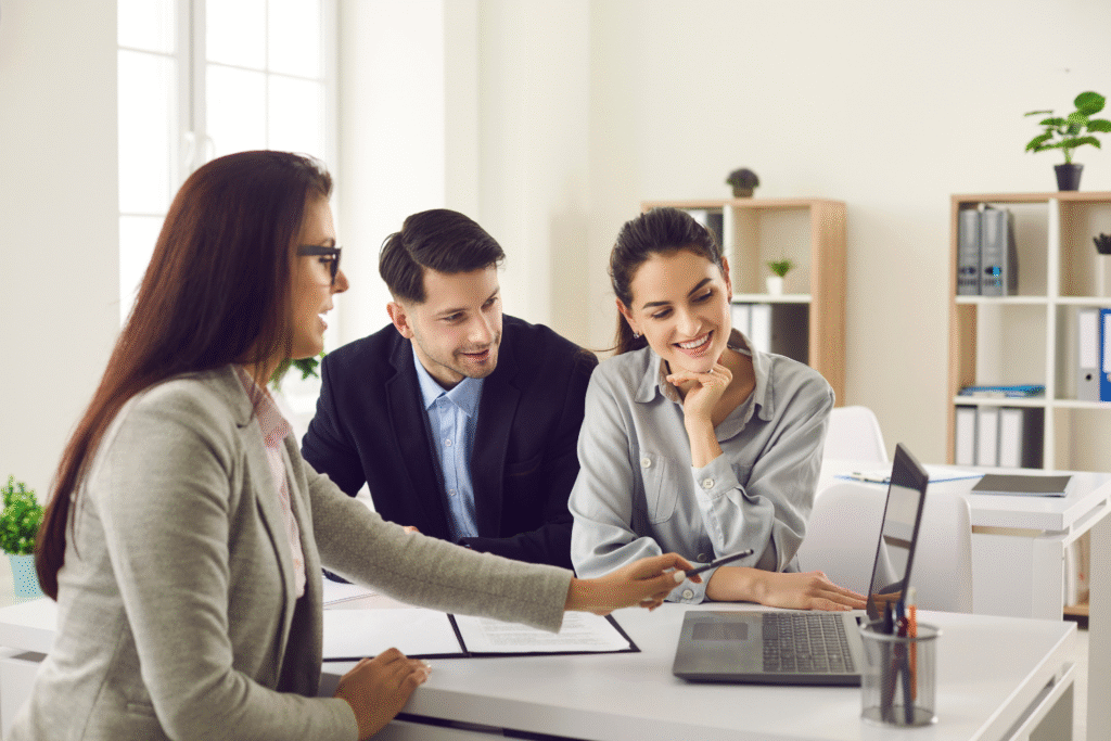 Broker and clients discussing something.