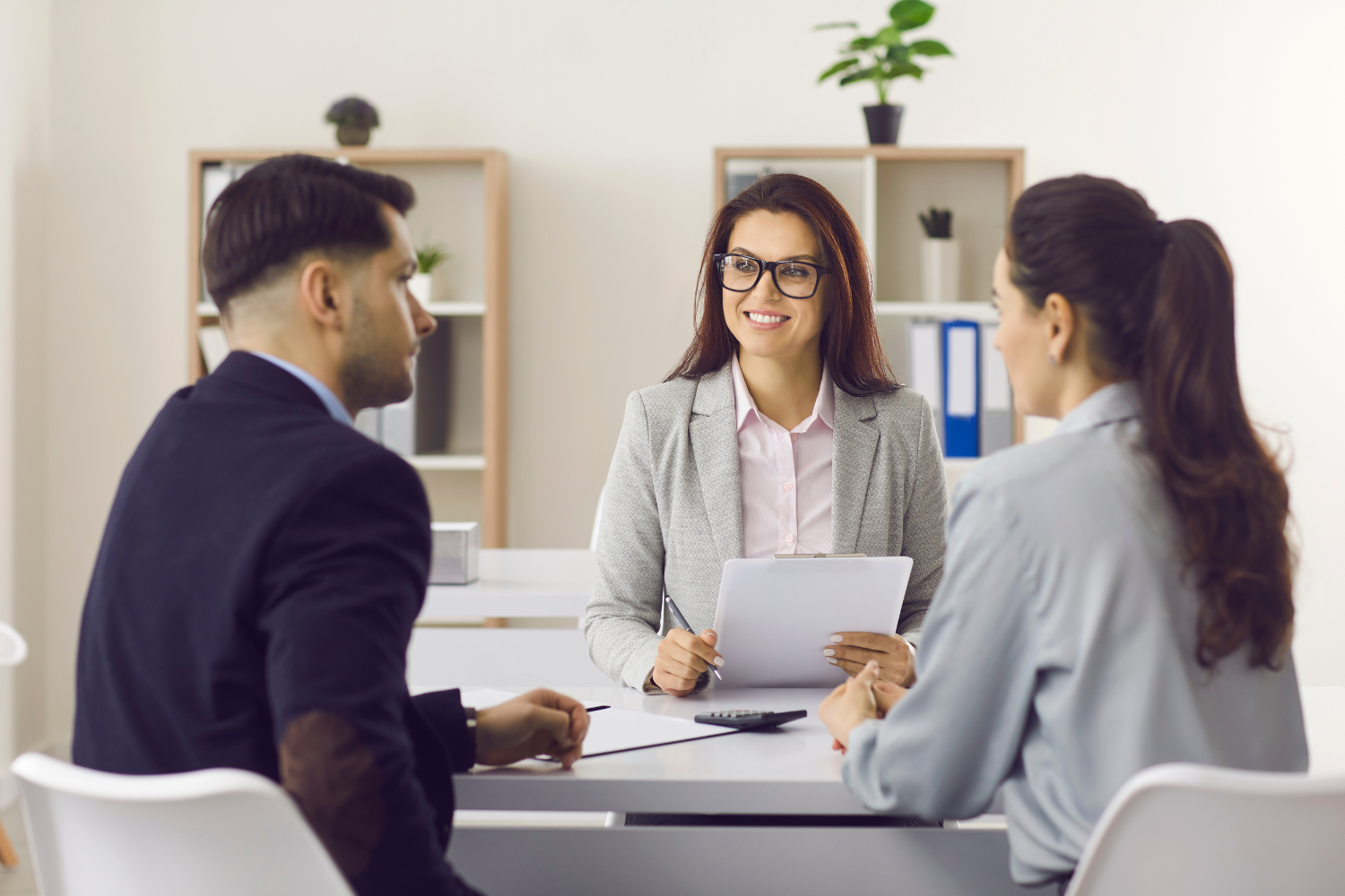 Clients speaking with broker.