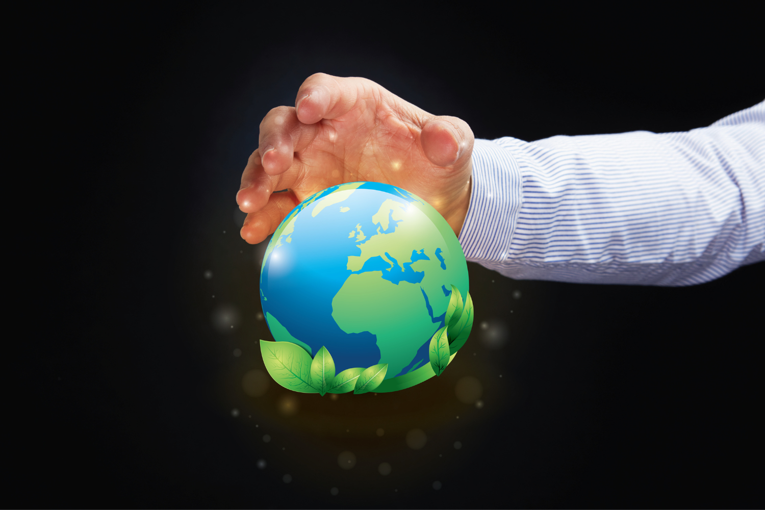 Person holding a visual of the earth.