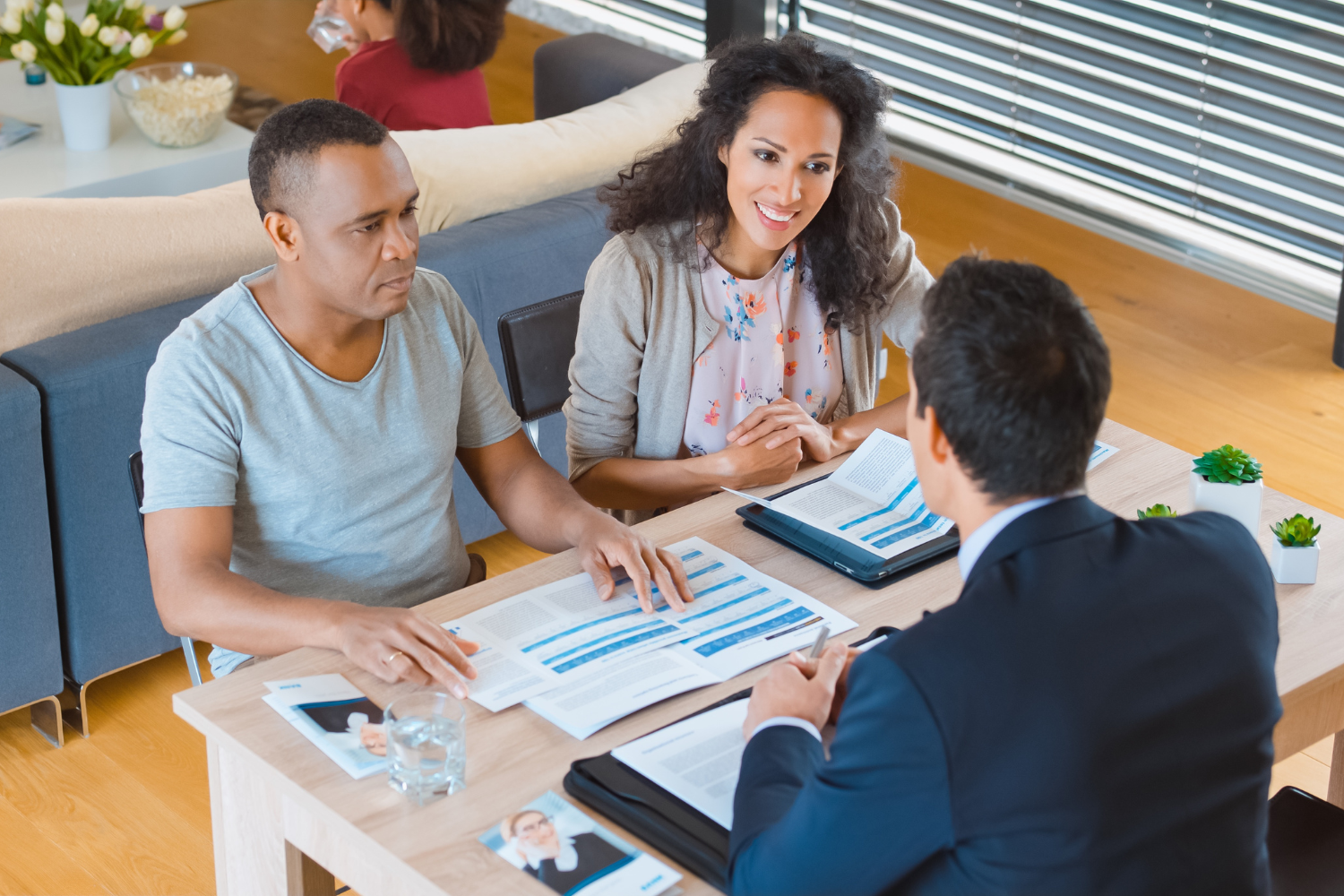 Business owners with a broker.