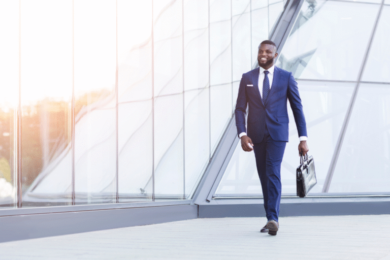 Business broker walking with brief case.