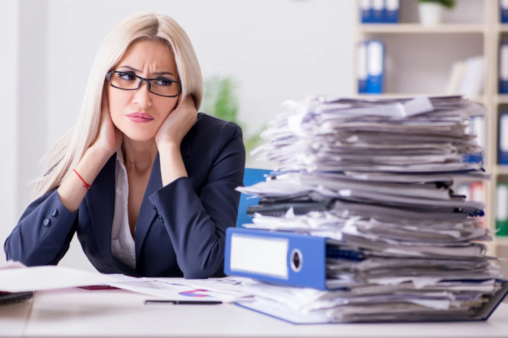 Business owner dealing with paperwork delays and deal issues