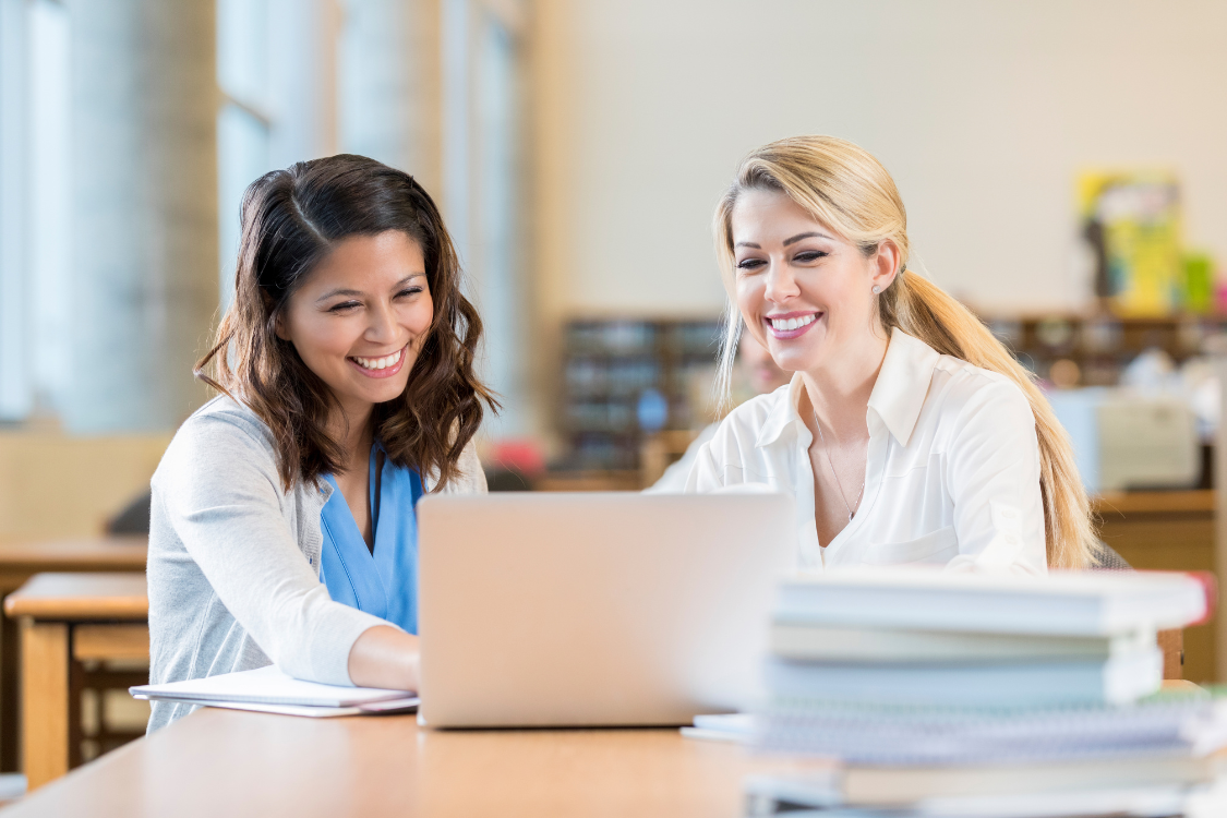 business owner reviewing broker fee breakdown with advisor