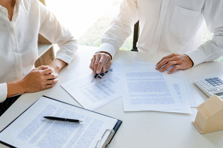 Business broker desk showing active, qualified buyer list with highlights and crossed-out unqualified contacts