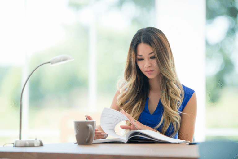 Business owner reviewing broker references to choose the right broker