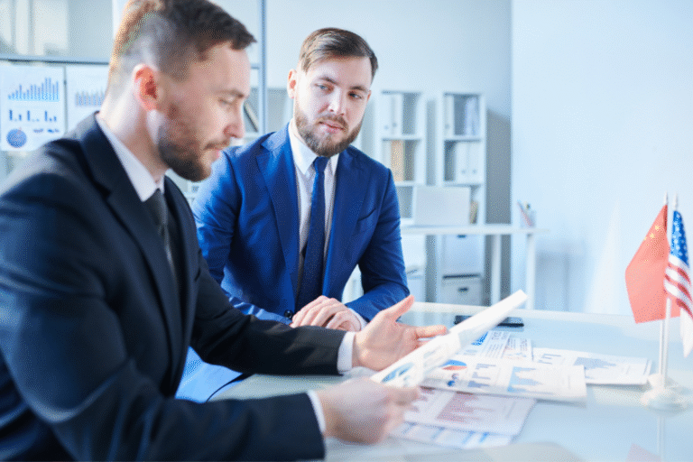 business owner and broker discussing a communication plan