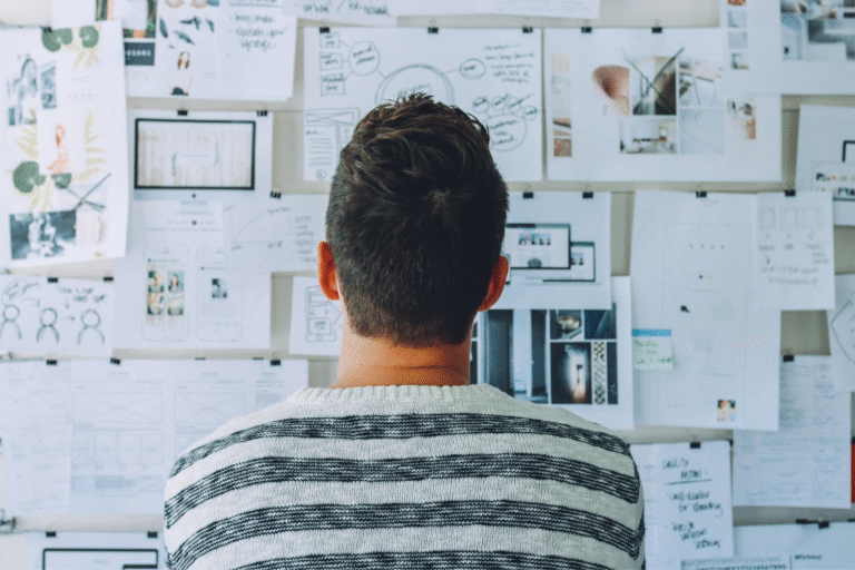 Business expert decoding broker jargon on a whiteboard