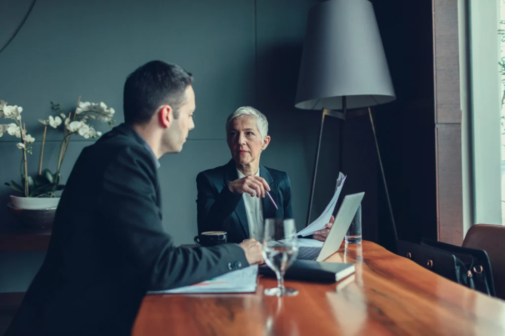 Investor respectfully asking a broker for reference contacts