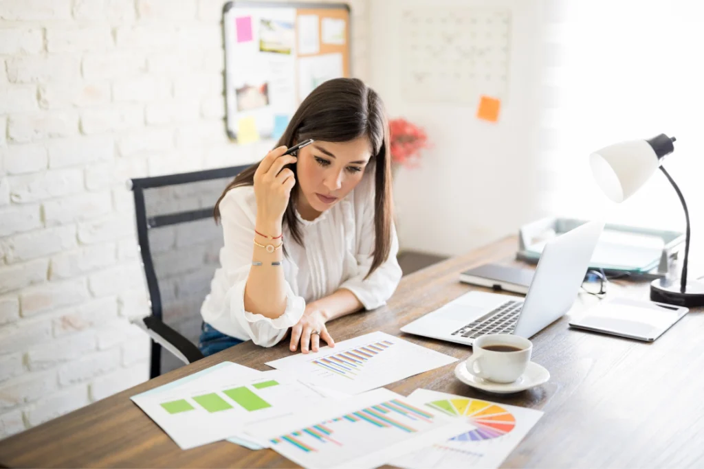 Person reviewing conflicting feedback in broker reference reports