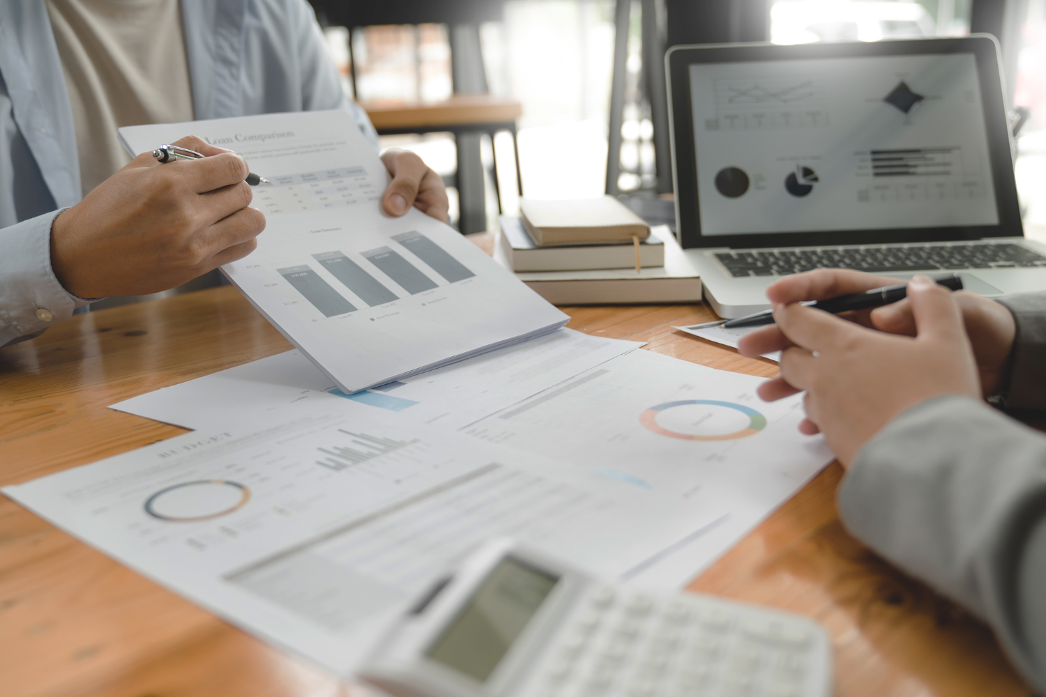 Two people reviewing data.