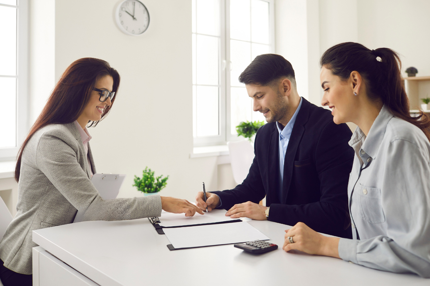 Business consultation with document signing, representing customer satisfaction signal check through buyer feedback, reviews, and retention.