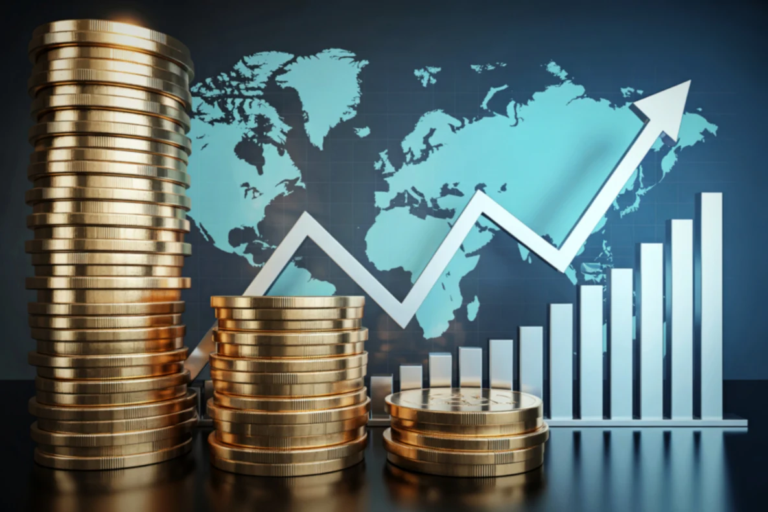 Stacks of gold coins in front of a world map with upward trending graph symbolizing global market growth and valuation.